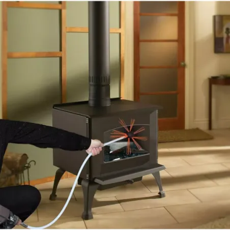 Limpieza de una estufa de combustión lenta con varillas flexibles